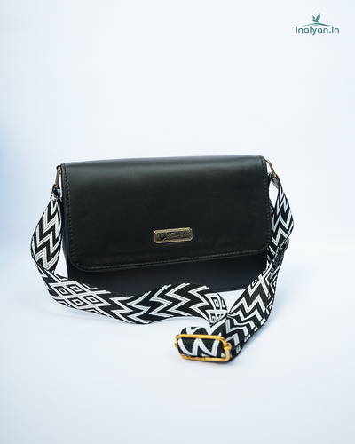 Sleek Black Crossbody Bag with Statement Strap